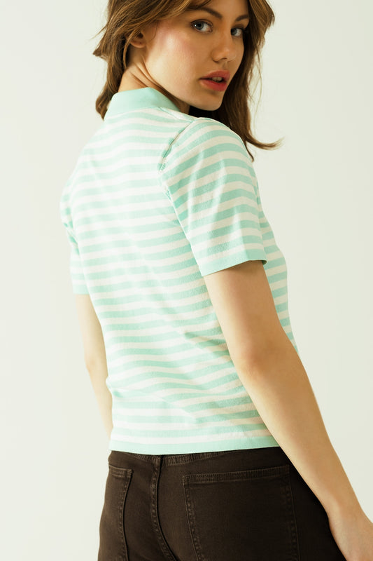 White short sleeves polo shirt with light blue stripes and frontal buttons details