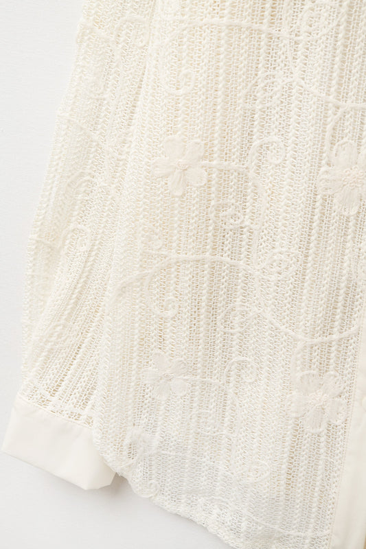 beige crochet shirt with embroidered details