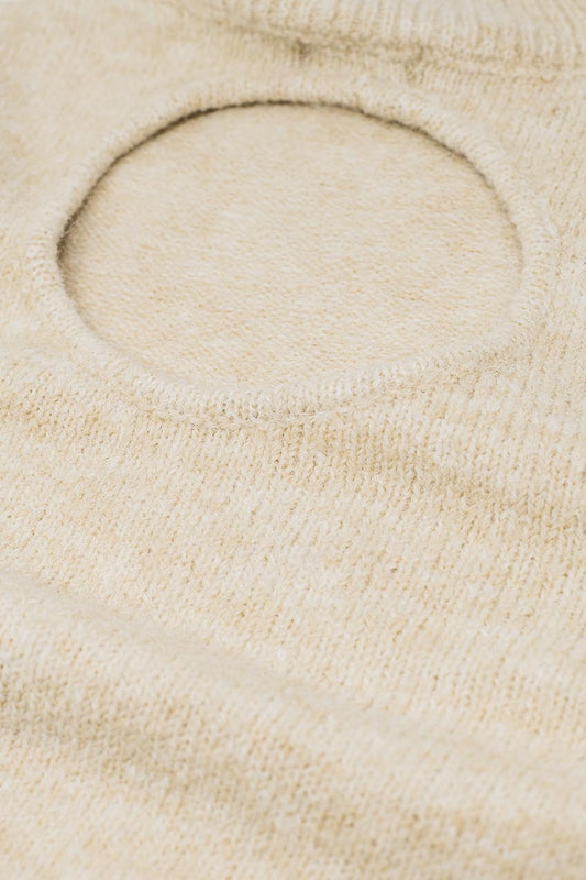 Jersey beige con manga larga y detalle de espalda abierta.