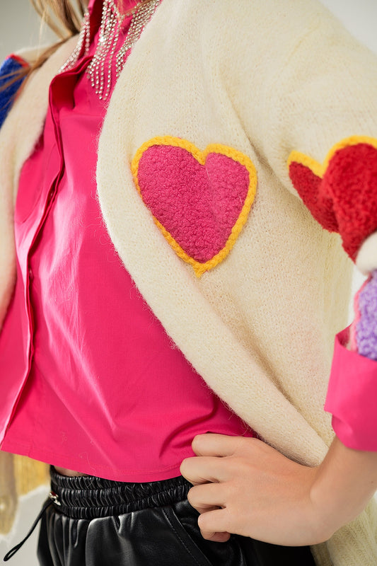 Beige knitted cardigan with embroidered hearts