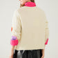 Beige knitted cardigan with embroidered hearts