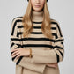 Beige oversized turtleneck sweater with black stripes and splits on the side