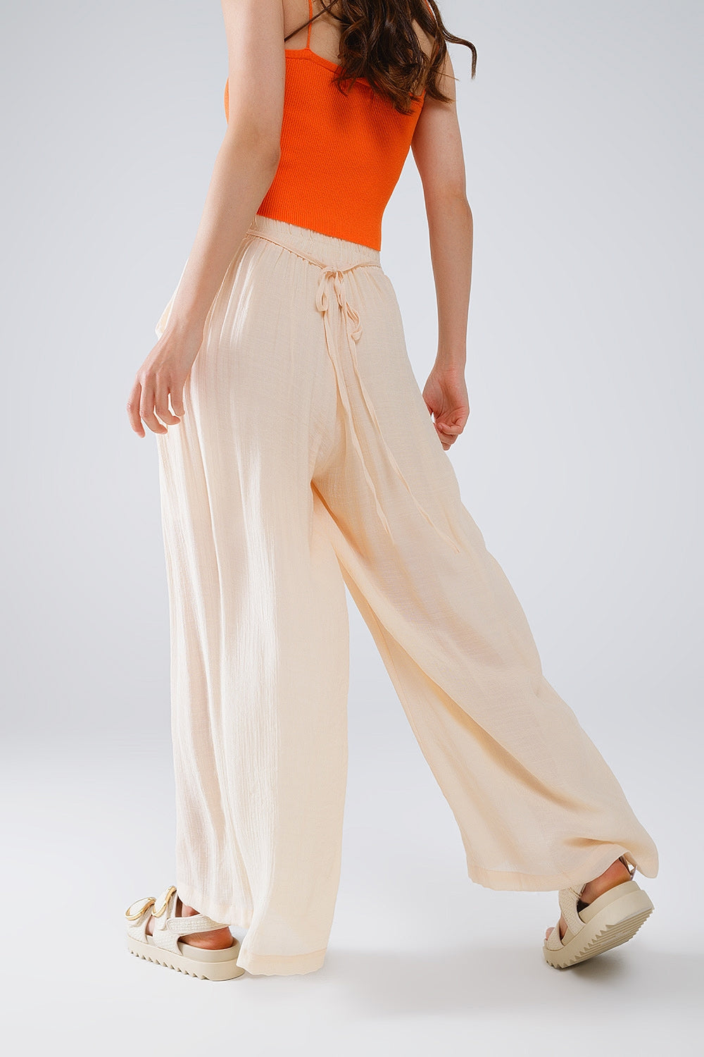 Beige Palazzo style Pants With Side Pockets And Thick Waist Band