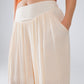 Beige Palazzo style Pants With Side Pockets And Thick Waist Band