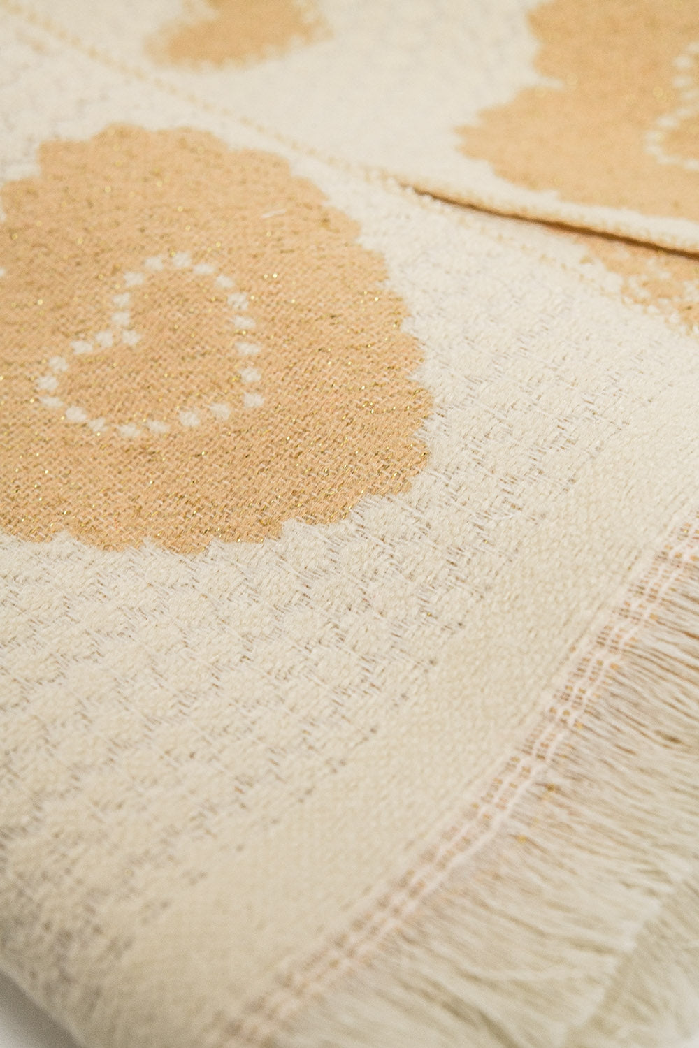 beige scarf with heart print and golden thread detail