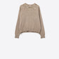 Q2 Beige soft knit sweater embellished with sequins on the front