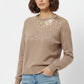 Beige soft knit sweater embellished with sequins on the front
