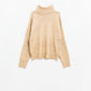 Beige turtleneck jumper with dropped sleeves