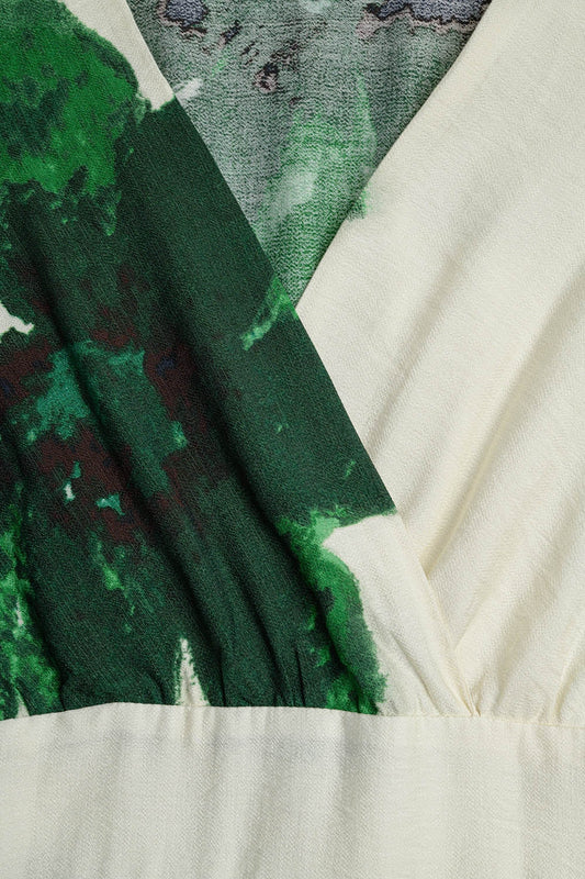 Beige wrap maxi dress with green tropical floral print and long sleeves