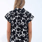 Black and white floral print shirt with short sleeves
