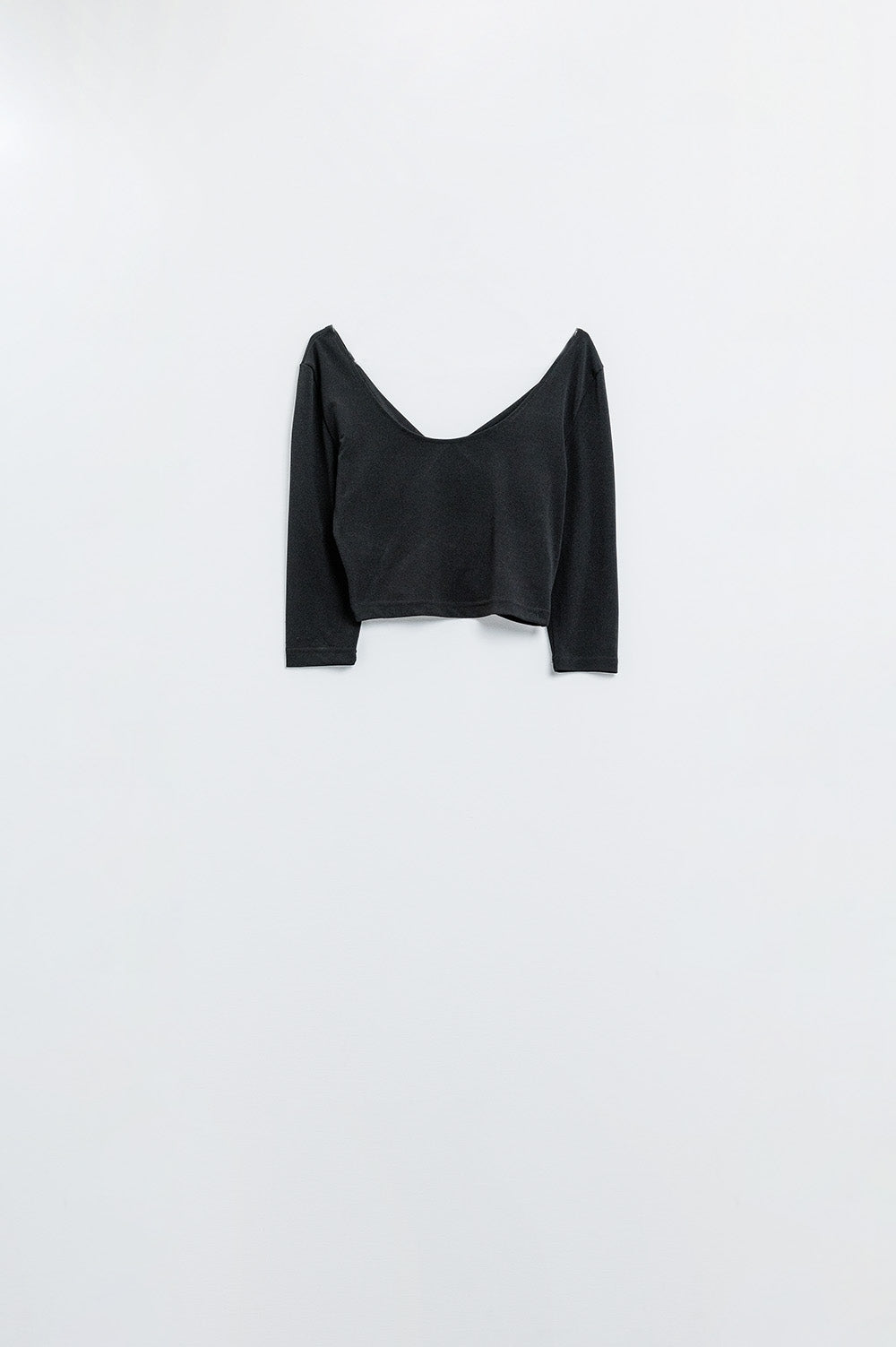 Q2 Black cropped top with elastic straps on the back