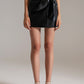 Black faux leather mini skirt with bow on the side