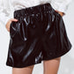 Black faux leather shorts