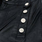 Black faux leather trousers with buttons