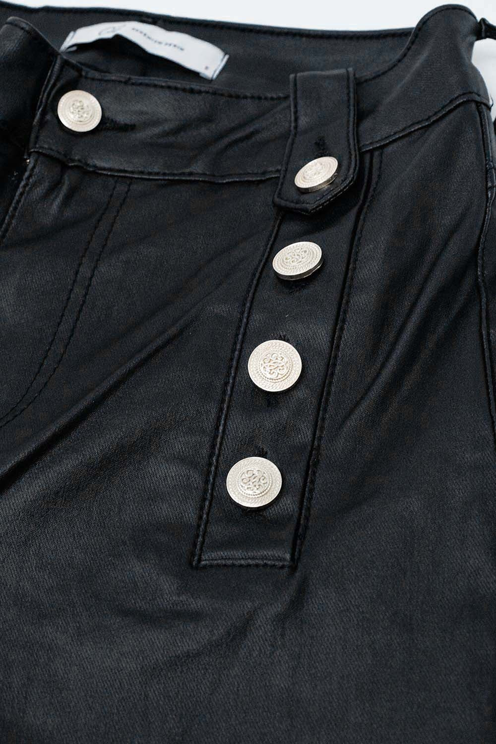 Black faux leather trousers with buttons