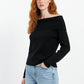 black fine knit sweater with wide boat neck