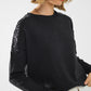 Black long sleeves sweater with sequins on the shoulders