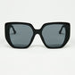 Q2 Black pin-up style sunglasses with geometric design and cat eyes