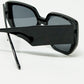 Black pin-up style sunglasses with geometric design and cat eyes