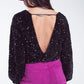 Black sequin top with V-Neckline ballon sleeves and Open Back