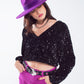 Black sequin top with V-Neckline ballon sleeves and Open Back