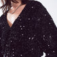 Black sequin top with V-Neckline ballon sleeves and Open Back