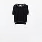 Q2 Black short sleeve sweater with white line detail