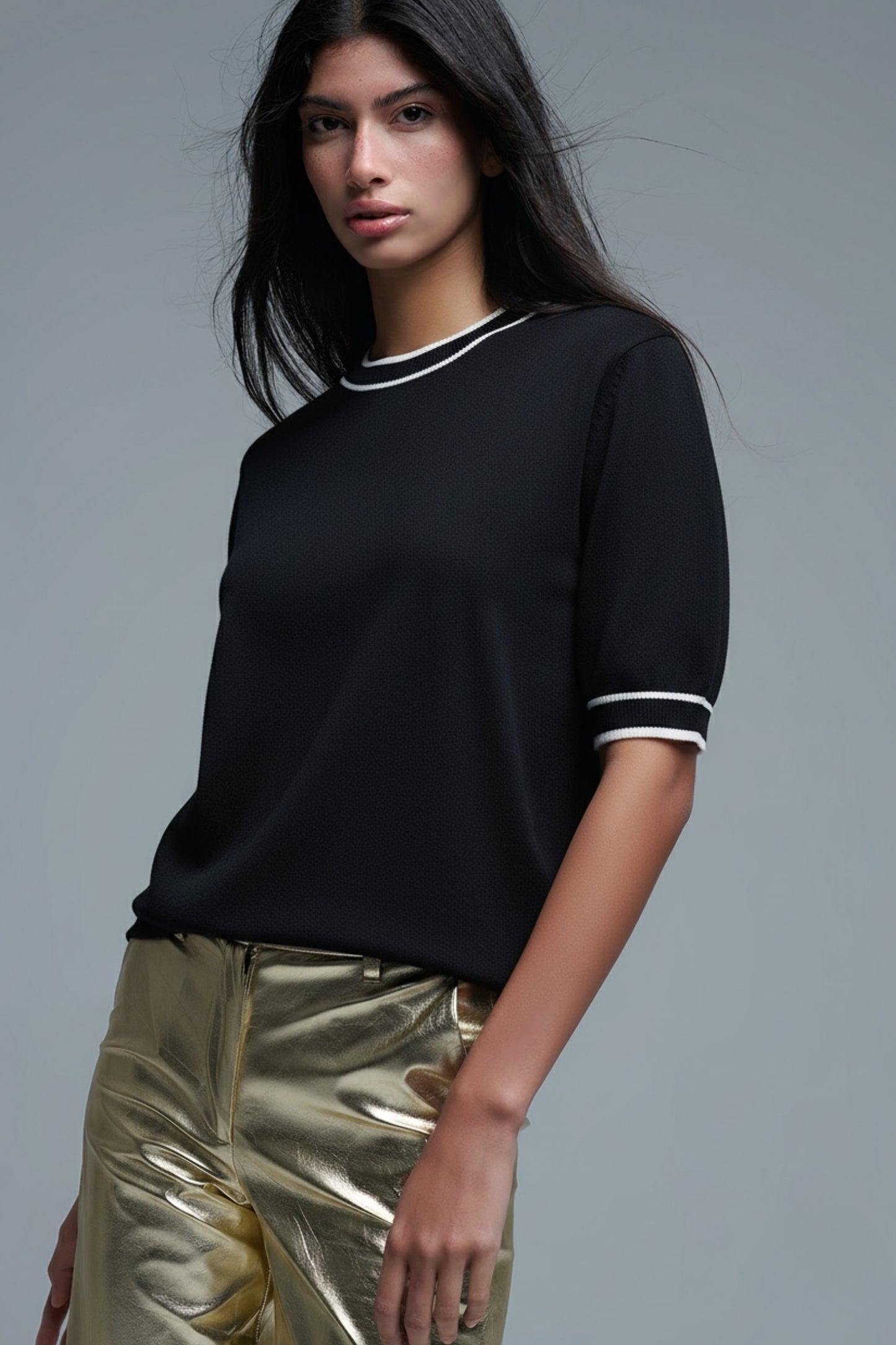 Black short sleeve sweater with white line detail