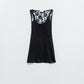 Q2 Black sleeveless top with lace detail