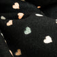 Black soft knit scarf with heart print