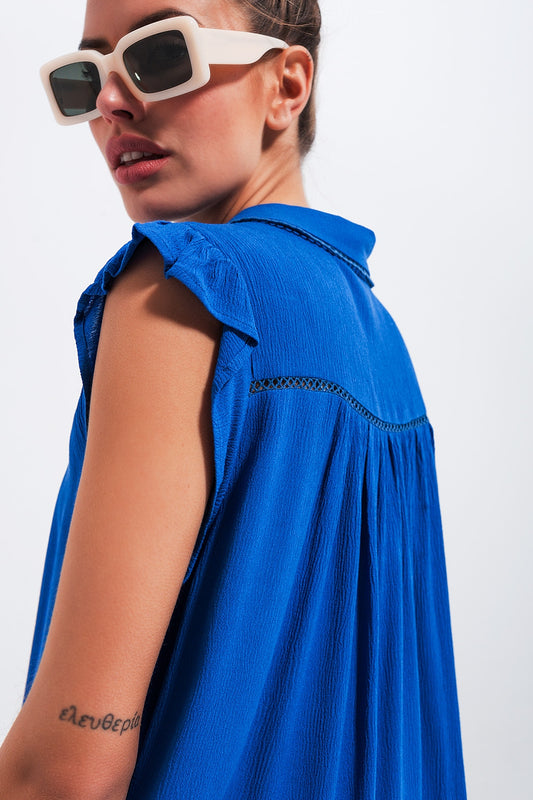 Blusa manga volante en azul