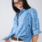 Q2 Blue Blouse with Floral Design and short sleeves