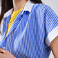 Blue shirt with short sleeves and vertical stripes