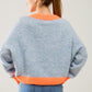 Oversized light blue/orange knit sweater