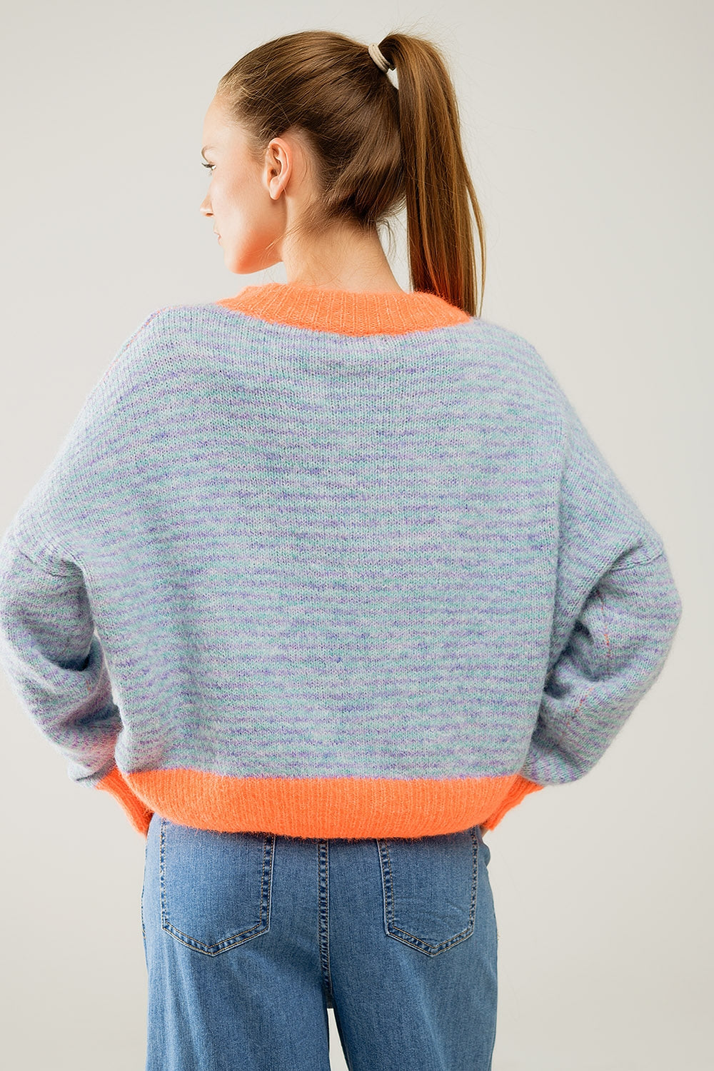 Oversized light blue/orange knit sweater