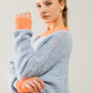 Oversized light blue/orange knit sweater