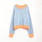 Oversized light blue/orange knit sweater