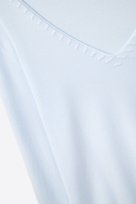 Blue sweater with V neckline