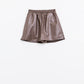 Brown faux leather shorts with gathering at the waist with drawstring