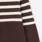 Brown oversized turtleneck sweater with white stripes and splits on the side