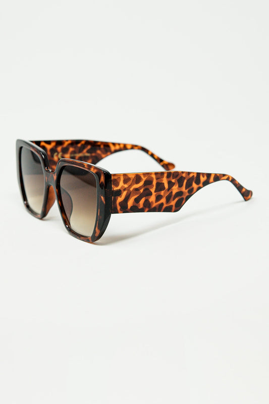 Brown pin-up style sunglasses with geometric design and cat eyes