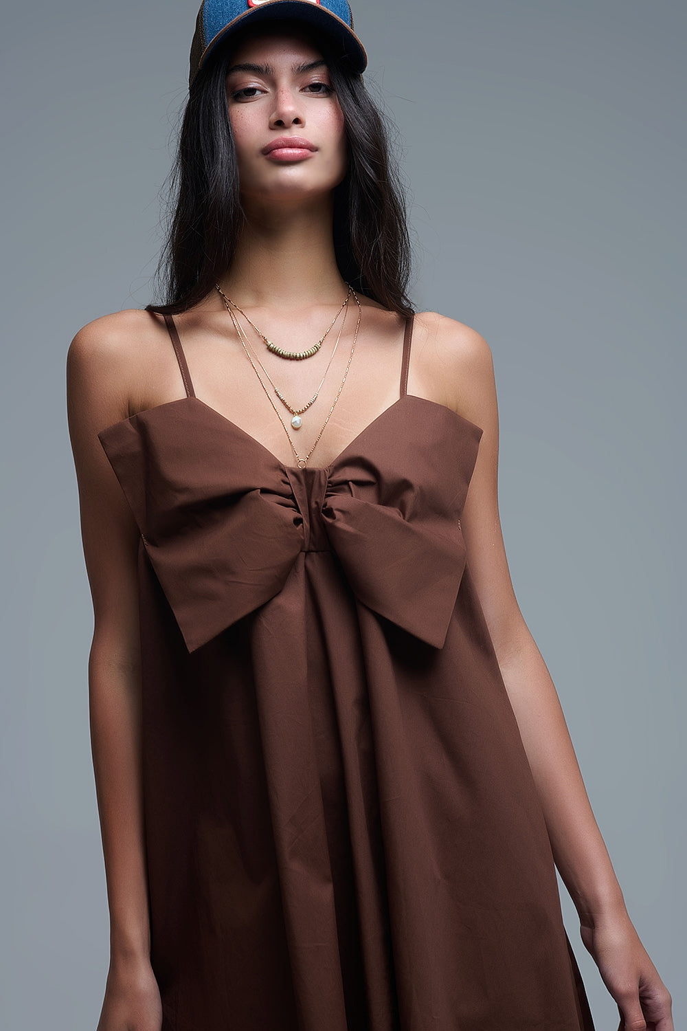 Brown poplin mini dress with a big bow detail