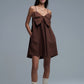 Brown poplin mini dress with a big bow detail