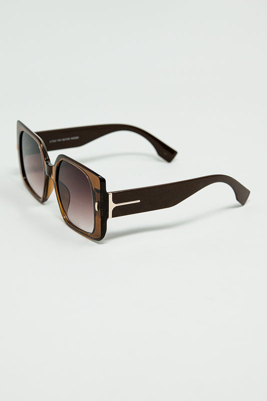 Brown square sunglasses with gold detail on the side