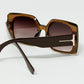 Brown square sunglasses with gold detail on the side