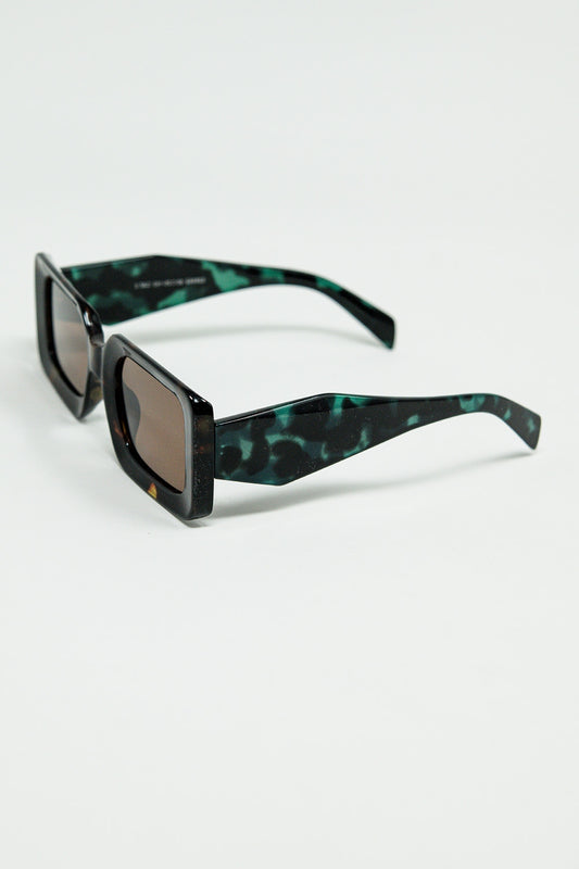 brown square sunglasses with green animal print on the side