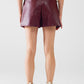 Burgundy faux leather shorts with gathering at the waist with drawstring