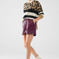 Burgundy faux leather shorts with gathering at the waist with drawstring