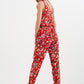 Cami strap jumpsuit in red floral print