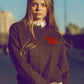 Q2 carbon grey sweater with red heart detail